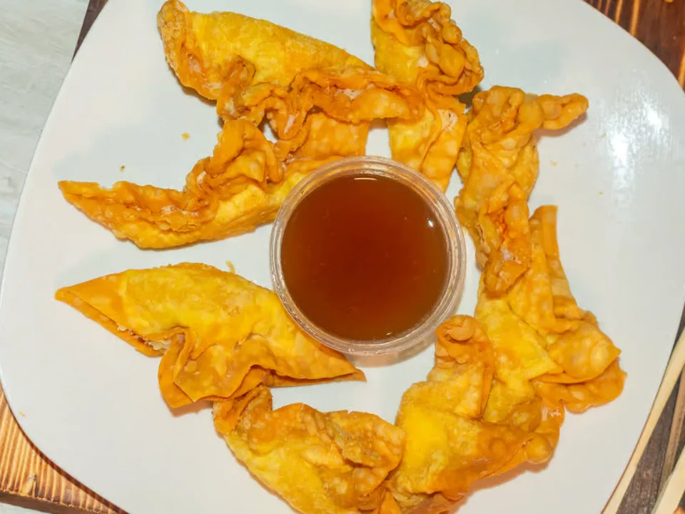 Crab Rangoon - Crispy wontons filled with cream cheese and crab